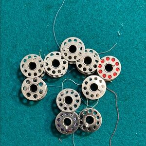 Vintage metal bobbins, 10 holes, set of 10